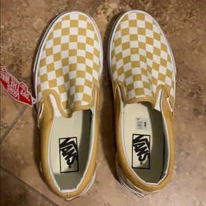 Vans checkerboard slip ons